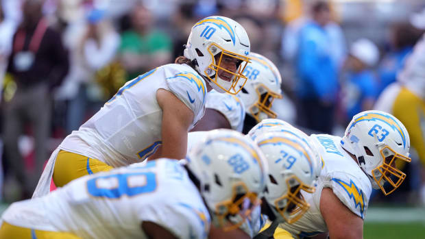 Nov 27, 2022; Glendale, Arizona, USA; Los Angeles Chargers quarterback Justin Herbert (10) warms up prior to facing the Arizona Cardinals at State Farm Stadium. Mandatory Credit: Joe Camporeale-USA TODAY Sports
