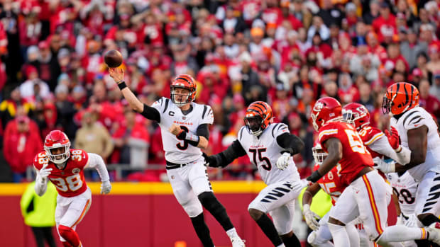Jan 30, 2022; Kansas City, Missouri, USA; Cincinnati Bengals quarterback Joe Burrow (9) passes the ball against the Kansas City Chiefs during the third quarter of the AFC Championship Game at GEHA Field at Arrowhead Stadium. Mandatory Credit: Jay Biggerstaff-USA TODAY Sports