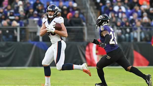 Denver Broncos tight end Greg Dulcich (80) runs after tthcatch during the second half against the Baltimore Ravens at M&T Bank Stadium.