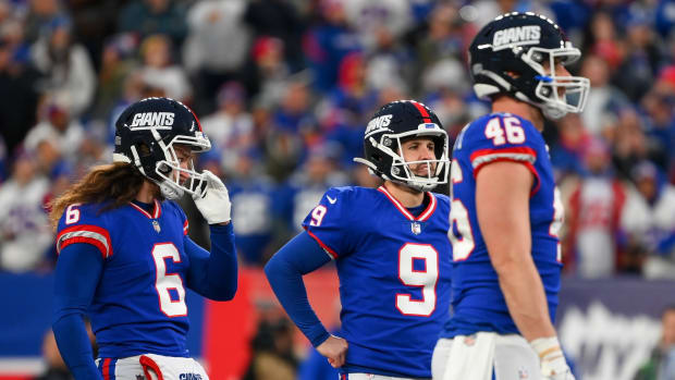 Dec 4, 2022; East Rutherford, New Jersey, USA; New York Giants punter Jamie Gillan (6) and place kicker Graham Gano (9) and tight end Nick Vannett (46) react to a missed field goal attempt against the Washington Commanders during overtime at MetLife Stadium.
