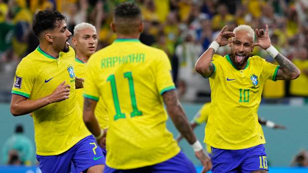 Neymar celebrates with Brazil.