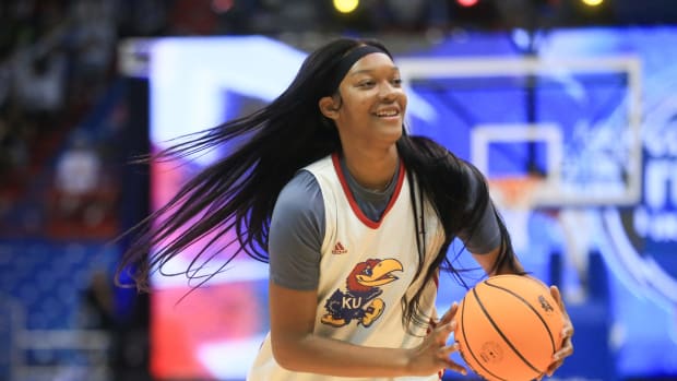 Kansas senior center Taiyanna Jackson (1) looks for a pass during Friday's scrimmage at Late Night in the Phog inside Allen Fieldhouse.