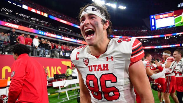Utah Utes tight end Dalton Kincaid (86) celebrates the victory against the Southern California Trojans in the PAC-12 Football Championship at Allegiant Stadium.