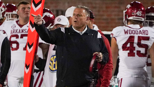 Nov 25, 2022; Columbia, Missouri, USA; Arkansas Razorbacks head coach Sam Pittman gestures on the sidelines against the Missouri Tigers during the second half at Faurot Field at Memorial Stadium. Mandatory Credit: Denny Medley-USA TODAY Sports