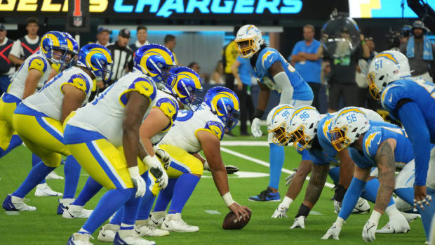 Aug 13, 2022; Inglewood, California, USA; A general overall view of the line of scrimmage as Los Angeles Rams guard Jeremiah Kolone (62) snaps the ball against the Los Angeles Chargers in the first half at SoFi Stadium. Mandatory Credit: Kirby Lee-USA TODAY Sports