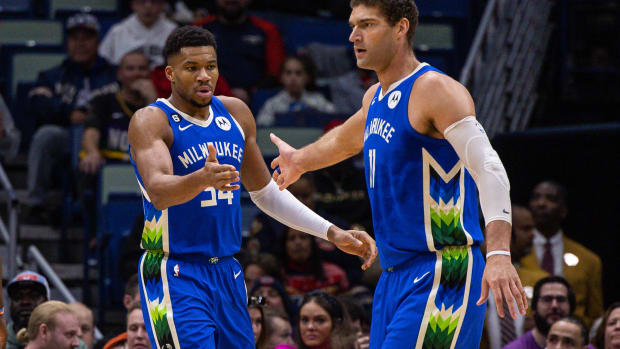 New Orleans, Louisiana, USA; Milwaukee Bucks forward Giannis Antetokounmpo (34) is congratulated by center Brook Lopez (11) after a play against the New Orleans Pelicans during the first half at Smoothie King Center.
