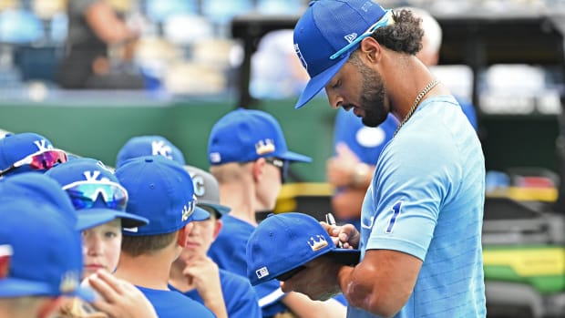 Aug 4, 2022; Kansas City, Missouri, USA; Kansas City Royals left fielder MJ Melendez (1) signs autographs for fans before a game against the Boston Red Sox at Kauffman Stadium. Mandatory Credit: Peter Aiken-USA TODAY Sports