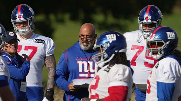 Oct 7,, 2022; Thundridge, United Kingdom; New York Giants offensive line coach Bobby Johnson during practice at Hanbury Manor.