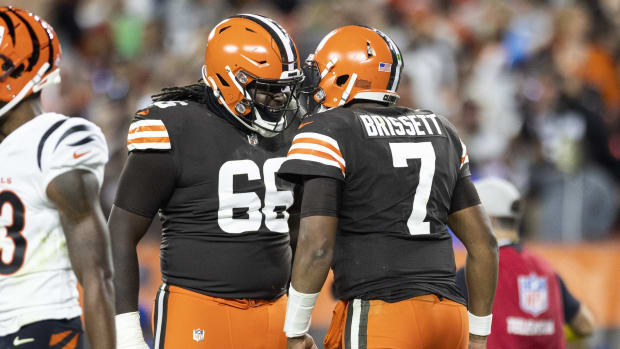 Oct 31, 2022; Cleveland, Ohio, USA; Cleveland Browns offensive tackle James Hudson III (66) celebrates a touchdown with quarterback Jacoby Brissett (7) during the fourth quarter against the Cincinnati Bengals at FirstEnergy Stadium. Mandatory Credit: Scott Galvin-USA TODAY Sports