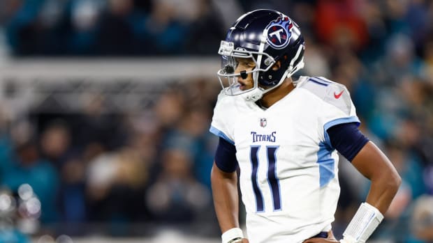Tennessee Titans quarterback Joshua Dobbs (11) reacts after giving up a fumble for a touchdown to Jacksonville Jaguars linebacker Josh Allen (41) during the fourth quarter at TIAA Bank Field.