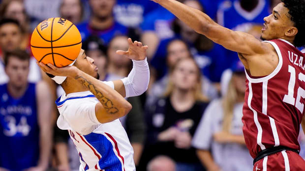 an 10, 2023; Lawrence, Kansas, USA; Kansas Jayhawks guard Dajuan Harris Jr. (3) shoots against Oklahoma Sooners guard Milos Uzan (12) during the first half at Allen Fieldhouse.