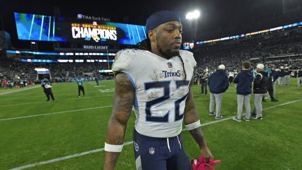 Tennessee Titans running back Derrick Henry (22) walks off the field after Saturday night's loss to the Jacksonville Jaguars, giving the Jaguars the AFC South title and a wildcard playoff game. The Jacksonville Jaguars hosted the Tennessee Titans to decide the AFC South championship at TIAA Bank Field in Jacksonville, FL, Saturday, January 7, 2023. The Jaguars went into the half trailing 7 to 13 but came back to win with a final score of 20 to 16.