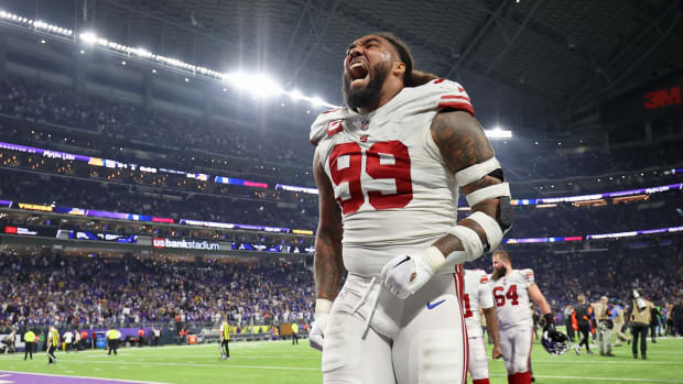 Jan 15, 2023; Minneapolis, Minnesota, USA; New York Giants defensive end Leonard Williams (99) reacts after winning a wild card game against the Minnesota Vikings at U.S. Bank Stadium.