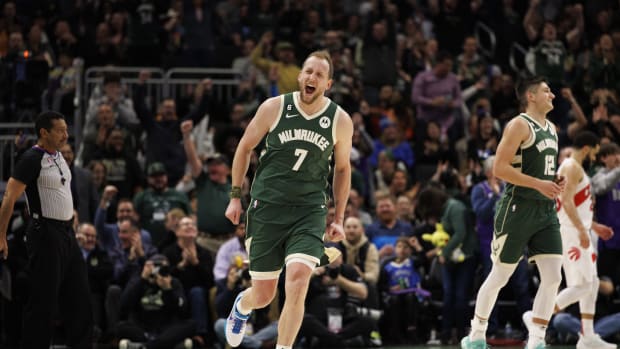 Milwaukee Bucks forward Joe Ingles (7) reacts following a made basket
