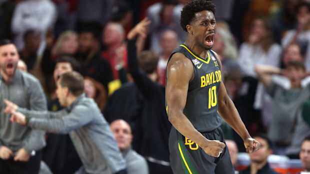 Baylor Bears guard Adam Flagler (10) celebrates after making a 3-pointer late in a men's college basketball game between the University of Oklahoma Sooners (OU) and the Baylor Bears at Lloyd Noble Center in Norman, Okla., Saturday, Jan. 21, 2023. Baylor won 62-60.