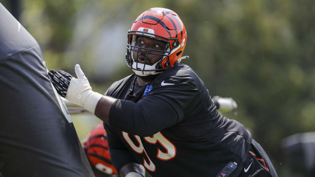 Cincinnati Bengals defensive tackle Tyler Shelvin (99) runs drills during training camp at Paul Brown Stadium.