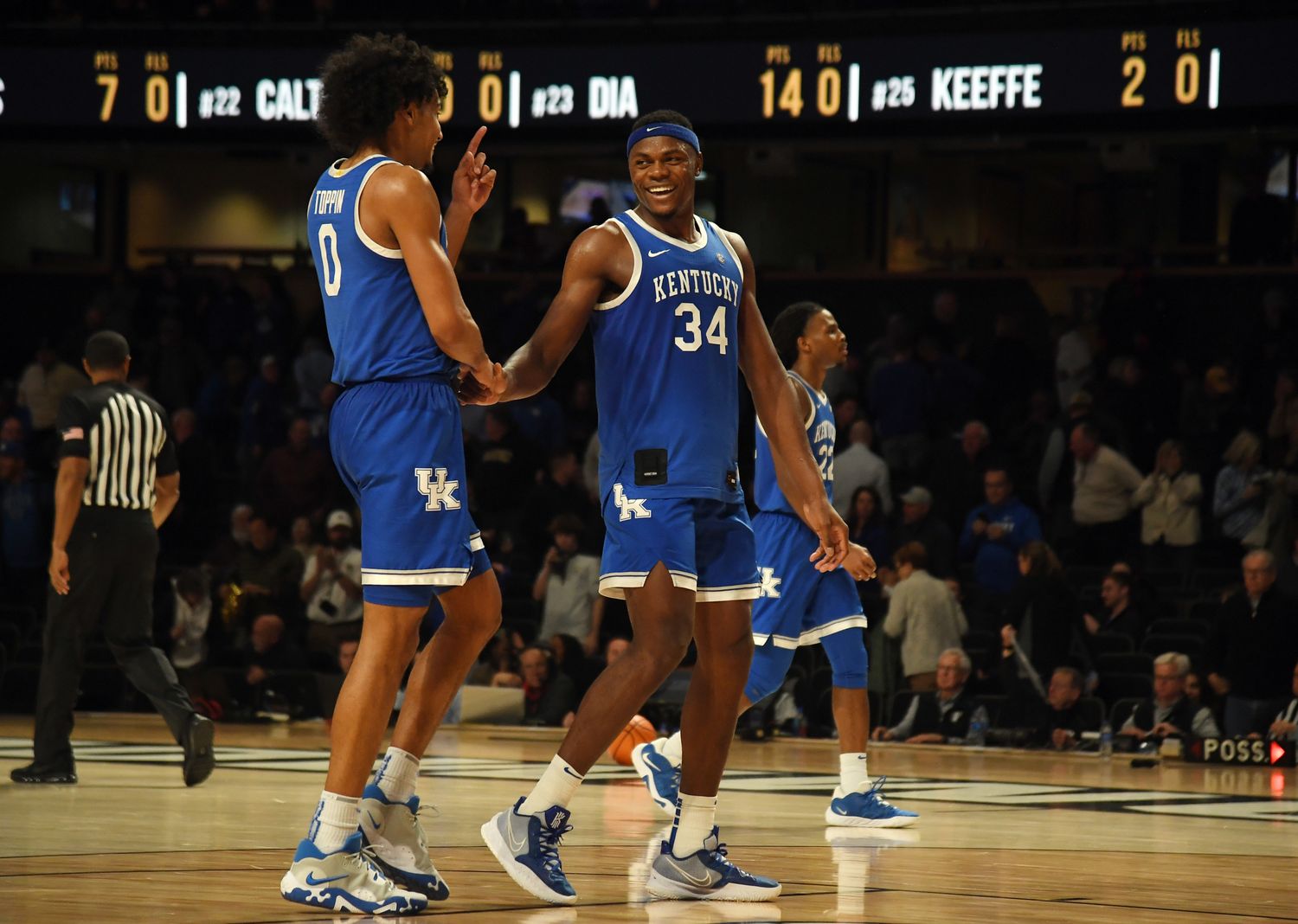 Jan 24, 2023; Nashville, Tennessee, USA; Kentucky Wildcats forward Jacob Toppin (0) and forward Oscar Tshiebwe (34) celebrate after a win against the Vanderbilt Commodores at Memorial Gymnasium