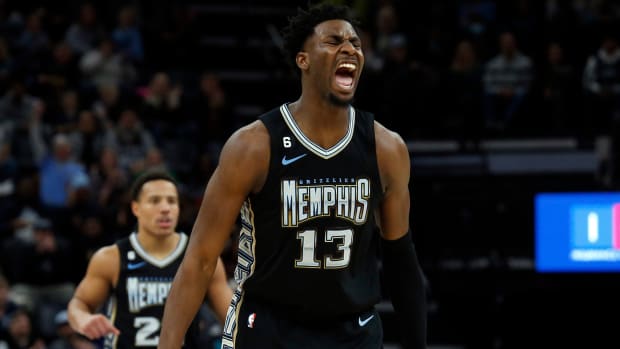 Grizzlies forward Jaren Jackson Jr. (13) reacts during a game against the Suns.