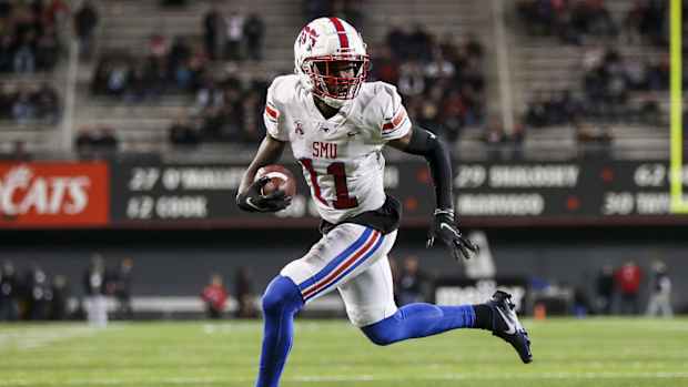 Southern Methodist Mustangs wide receiver Rashee Rice (11) runs the ball in for a touchdown against the Cincinnati Bearcats in the second half at Nippert Stadium.