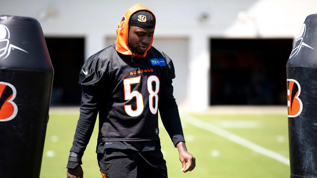 Bengals defensive end Joseph Ossai (58) walks back to the line after a drill during Bengals spring practice in Cincinnati.