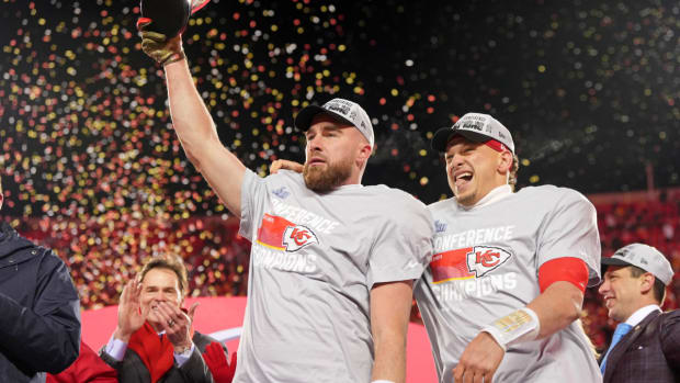 Jan 29, 2023; Kansas City, Missouri, USA; Kansas City Chiefs tight end Travis Kelce (left) and quarterback Patrick Mahomes (15) celebrate after winning the AFC Championship game against the Cincinnati Bengals at GEHA Field at Arrowhead Stadium. Mandatory Credit: Jay Biggerstaff-USA TODAY Sports