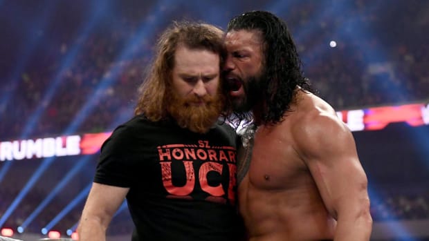 Roman Reigns yells at Sami Zayn after defeating Kevin Owens at the Royal Rumble