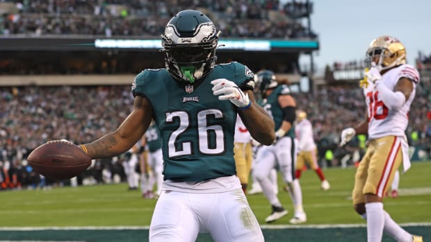 Jan 29, 2023; Philadelphia, Pennsylvania, USA; Philadelphia Eagles running back Miles Sanders (26) scores a touchdown against the San Francisco 49ers during the second quarter in the NFC Championship game at Lincoln Financial Field.