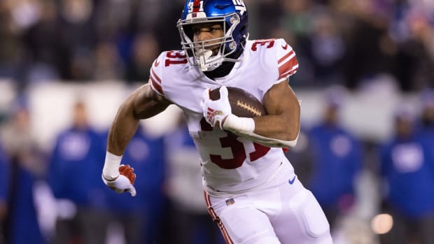Jan 21, 2023; Philadelphia, Pennsylvania, USA; New York Giants running back Matt Breida (31) runs for a touchdown against the Philadelphia Eagles in the third quarter during an NFC divisional round game at Lincoln Financial Field.