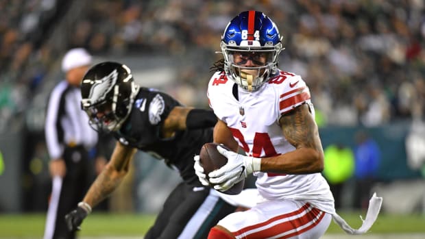 Jan 8, 2023; Philadelphia, Pennsylvania, USA; New York Giants wide receiver Marcus Johnson (84) makes a catch against Philadelphia Eagles cornerback Darius Slay (2) during the third quarter at Lincoln Financial Field.
