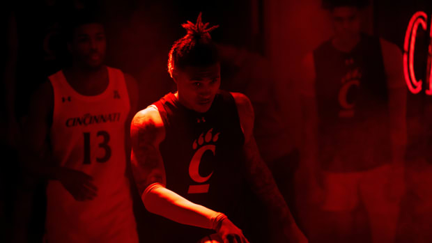 Cincinnati Bearcats guard Jeremiah Davenport (24) dribbles out onto the court before the NCAA men s basketball game between the Cincinnati Bearcats and East Carolina Pirates at Fifth Third Arena in Cincinnati on Wednesday, Jan. 11, 2023. Ncaa Basketball Eastern Carolina Pirates At Cincinnati Bearcats