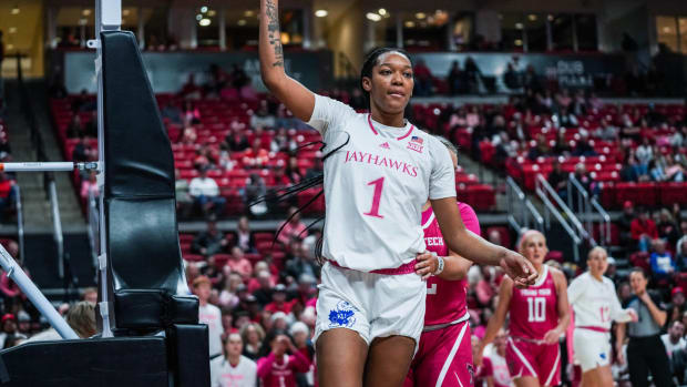 Kansas senior center Taiyanna Jackson celebrates after scoring against the Texas Tech Red Raiders in Lubbock, TX.