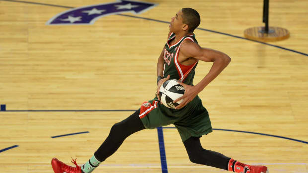 Milwaukee Bucks guard Giannis Antetokounmpo (34) goes up for a dunk during the 2014 NBA All Star skills challenge