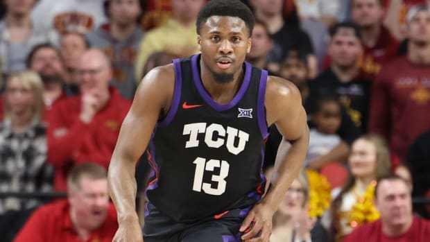 Feb 15, 2023; Ames, Iowa, USA; TCU Horned Frogs guard Shahada Wells (13) sets the offense against the Iowa State Cyclones during the second half at James H. Hilton Coliseum.