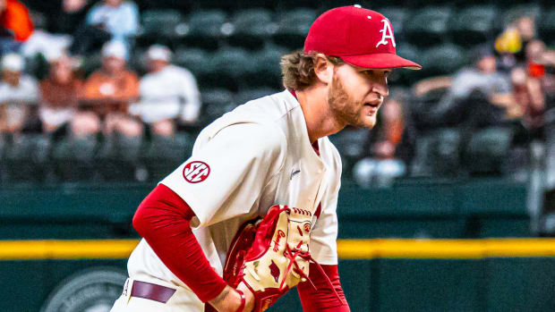 Arkansas Razorbacks pitcher Hunter Hollan on the mound against Oklahoma State on Sunday afternoon.
