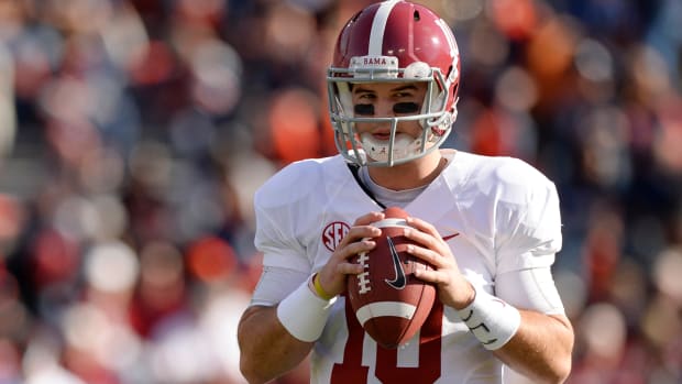 Alabama Crimson Tide quarterback AJ McCarron (10) warms up prior to the game against the Auburn Tigers at Jordan Hare Stadium.