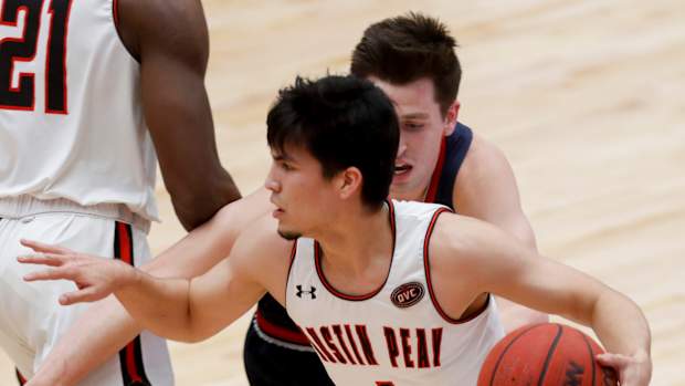 Austin Peay's Carlos Paez (1) navigates down the court in an OVC conference basketball game between the Austin Peay Governors and Belmont Bruins at APSU's Winfield Dunn Center in Clarksville, Tenn., on Thursday, Jan. 28, 2021.