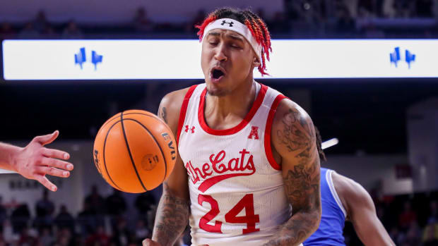 Jan 22, 2023; Cincinnati, Ohio, USA; Cincinnati Bearcats guard Jeremiah Davenport (24) reacts after a play by the Memphis Tigers during the second half at Fifth Third Arena. Mandatory Credit: Katie Stratman-USA TODAY Sports