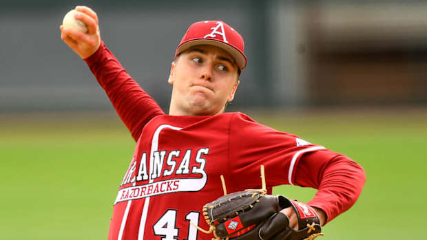 Arkansas Razorbacks Will McEntire on the bases against Eastern Illinois on Saturday afternoon.