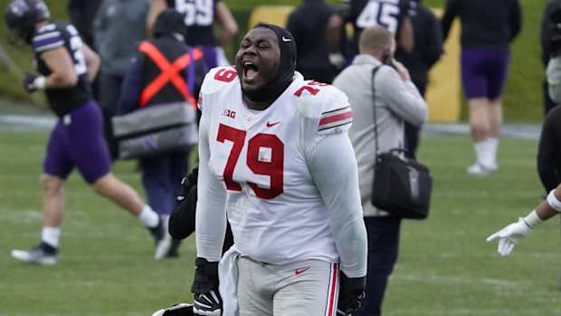 Ohio State offensive lineman Dawand Jones celebrates win