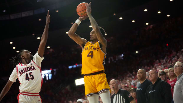 Arizona State Sun Devils guard Desmond Cambridge Jr. (4) shoots the ball over Arizona Wildcats guard Courtney Ramey
