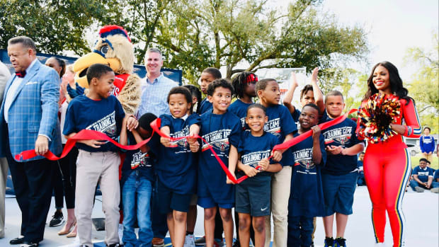 Pelicans unveil the renovated basketball court at the Cheniere Energy Boys & Girls Clubs at Columbus Circle Recreation Center.