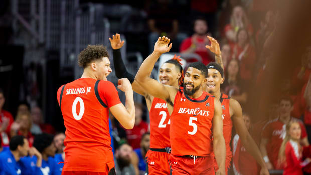 Cincinnati Bearcats guard David DeJulius (5) celebrates after making his last three-point shot during the second half of an NCAA men s college basketball game on Sunday, March 5, 2023, at Fifth Third Arena in Cincinnati. DeJulius exhausted his eligibility during the final game of the Bearcats regular season, defeating the Mustangs 97-74. Southern Methodist Mustangs At Cincinnati Bearcats Ncaa Basketball March 5 2023