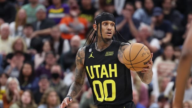 Utah Jazz guard Jordan Clarkson (00) dribbles the ball against the San Antonio Spurs in the second half at Vivint Arena.