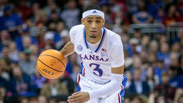 Mar 9, 2023; Kansas City, MO, USA; Kansas Jayhawks guard Dajuan Harris Jr. (3) brings the ball up court during the first half against the West Virginia Mountaineers at T-Mobile Center. Mandatory Credit: William Purnell-USA TODAY Sports