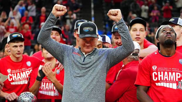 Mar 11, 2023; Las Vegas, NV, USA; Arizona Wildcats heads coach Tommy Lloyd celebrates after the Wildcats defeated the UCLA Bruins 61-59 to win the Pac-12 Tournament Championship at T-Mobile Arena.