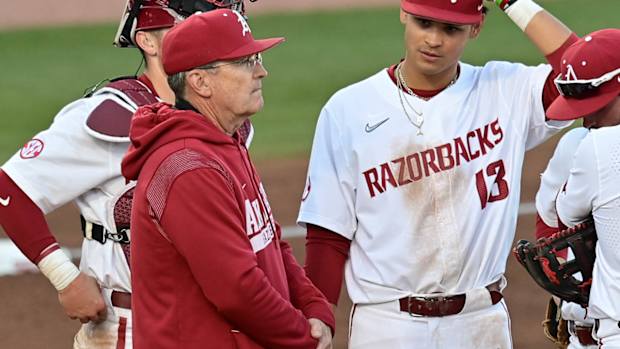 Arkansas Razorbacks coach Dave Van Horn makes pitching change against UNLV