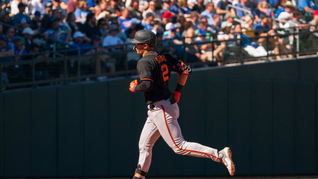 SF Giants catcher Blake Sabol celebrates after hitting a home run in the fourth inning during a spring training game against the Chicago Cubs at Sloan Park. (2023)