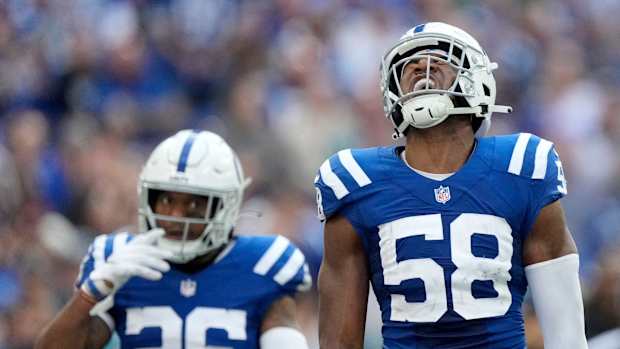 Indianapolis Colts safety Rodney McLeod Jr. (26) and Indianapolis Colts linebacker Bobby Okereke (58) celebrate a defensive stop Sunday, Oct. 16, 2022, during a game against the Jacksonville Jaguars at Lucas Oil Stadium in Indianapolis