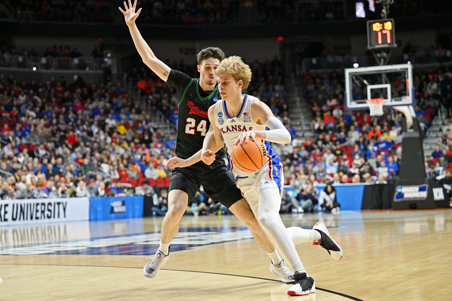Mar 16, 2023; Des Moines, IA, USA; Kansas Jayhawks guard Gradey Dick (4) dribbles the ball against Howard Bison forward Jordan Wood (24) during the first half at Wells Fargo Arena.