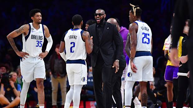 lebron james kyrie irving christian wood reggie bullock mavericks